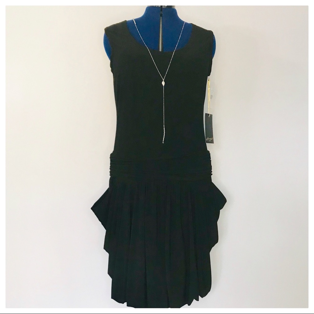 New Black dress size 12 side pockets on hips NWT